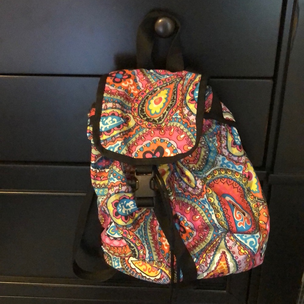 LeSportsac 2strap backpack with synch and buckle.